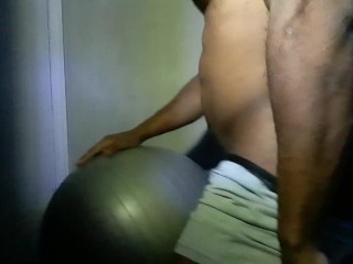 Muscular Stud Backshots Training on Exercise Ball