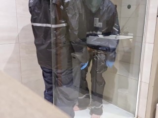 Rainwear pissing and doggy in the shower