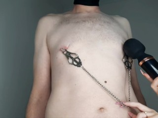 Games with a vibrator. Dominatrix Nika painfully plays with slave's nipples, balls and dick. BDSM