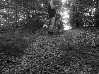 Naked submissive slut taken for a walk on a leash in forest