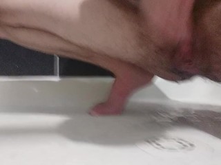 Trans guy squatting in the shower masterbating and squirting