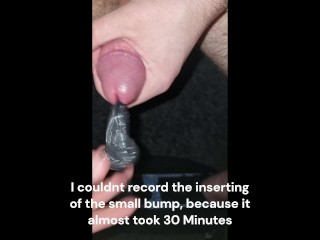 Inserting my small Dilator fully with a condom inside, Stretching me to the limit