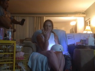 Roommate masturbating to pretty girl in minidress painting her nails and watching tv