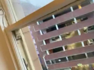 Sissy fucking its self in the window for everyone to see