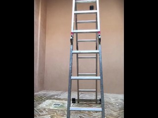 Dirty construction worker climbing up a ladder and jerking off