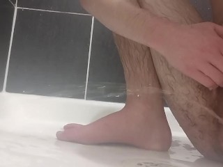 Pissing hard across the shower