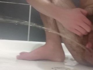 Pissing hard across the shower