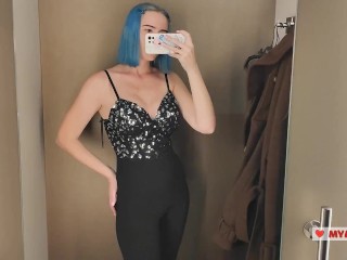 Trying on mini dresses and sexy clothes in a shopping center. Spy on me in the fitting room and jerk