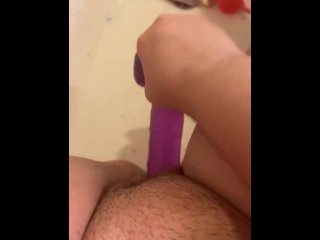 Fucking my pussy in the bathtub with a dildo