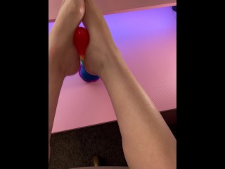 Giving my favorite rainbow cock a teasing footjob