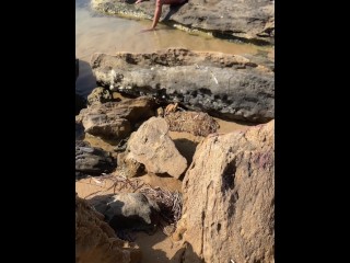 A fan caught me while I was touching myself on the beach