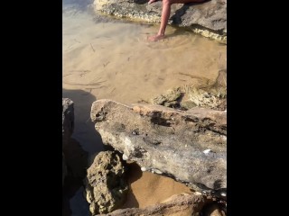 A fan caught me while I was touching myself on the beach