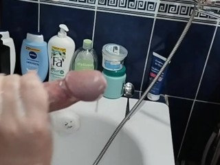 Bitch jerks off my hard soapy cock until I cum