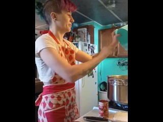 cooks pasta sauce in a little outfit