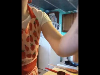 cooks pasta sauce in a little outfit