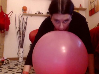 Italian girl has fun with balloons and fills them with hot wet orgasms