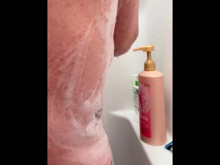 Dirty Red Hooker Lathering Up Her Big Tits and Perfect Pussy in the Shower