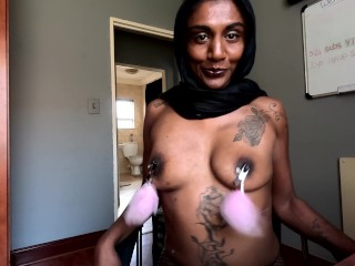 Desi in hijab smoking while wearing nipple clamps