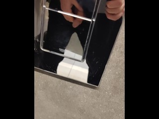 Pissing and wanking in the mall toilet.