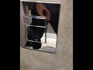 Pissing and wanking in the mall toilet.