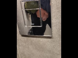 Pissing and wanking in the mall toilet.