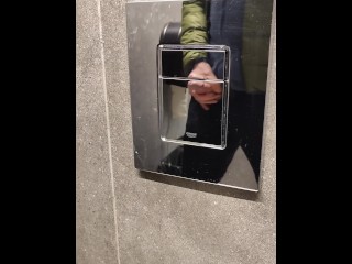 Pissing and wanking in the mall toilet.