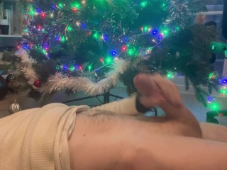 Happy Christmas - big cock jerked to cumshot on stomach under the Christmas tree. Horny & hung jerk
