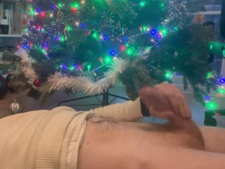 Happy Christmas - big cock jerked to cumshot on stomach under the Christmas tree. Horny & hung jerk