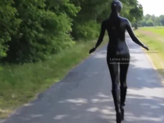 Living rubberdoll walks outdoor Latex