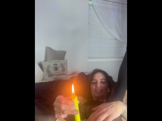MILF puts a candle in her pussy and wants to light up your night.
