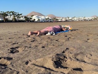 Girl flashing pussy on public beach,  no panties