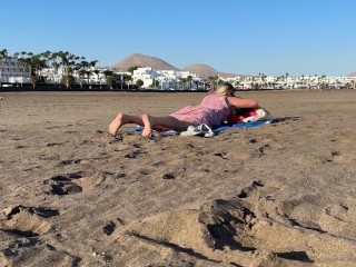 Girl flashing pussy on public beach,  no panties