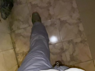 Hands-free pissing in a public toilet from an uncut dick