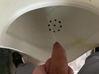 Pissing from an uncut big cock in the office toilet