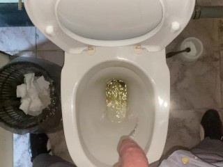Pissing without hands in an office public toilet from an uncut penis. POV 4K
