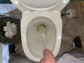 Pissing without hands in an office public toilet from an uncut penis. POV 4K