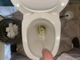 Pissing without hands in an office public toilet from an uncut penis. POV 4K