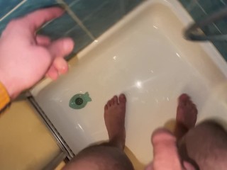 GUY FUCKS A RUBBER PUSSY IN THE SHOWER CABIN/CUM MOAN