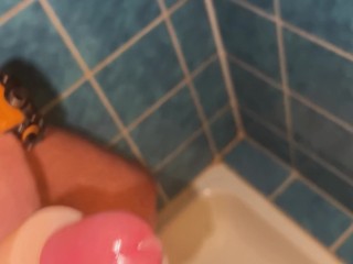 GUY FUCKS A RUBBER PUSSY IN THE SHOWER CABIN/CUM MOAN