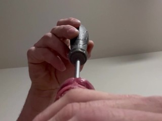 Inserting screwdriver in my big white cocks urethra