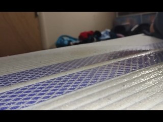 Bare mattress piss puddle