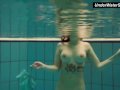 Big titted Dashka bounces body underwater