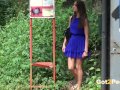 Pretty brunette is nearly caught pissing in a bus stop!