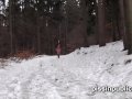 Girls in need skate around in the snow to find a proper place to have a pee