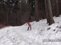 Girls in need skate around in the snow to find a proper place to have a pee