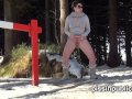 Girls in need skate around in the snow to find a proper place to have a pee