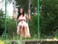 Naughty Girl Pisses While On The Swing