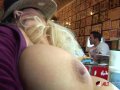 Shyla Stylez gets tattooed while playing with her tits