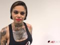 Interview with busty tattooed babe Genevieve Sinn