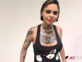 Interview with busty tattooed babe Genevieve Sinn